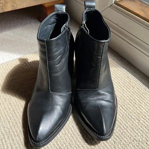 John Fluevog black leather boots with zipper.
